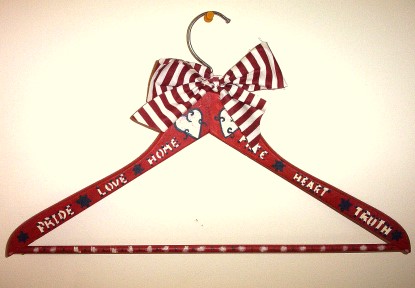 This is a photo of the finished Americana-style Wooden Hanger Decoration project