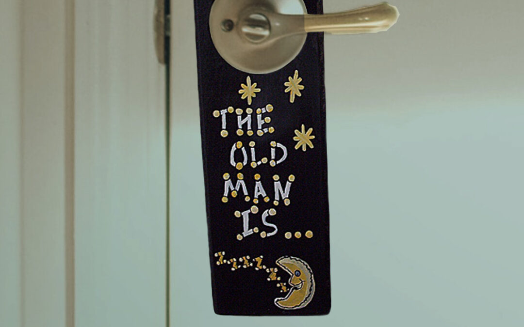 This is a photo of the finished this old man is sleeping door hanger