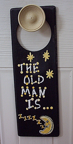 This is a photo of the finished Dad's Sleepy Door Hanger